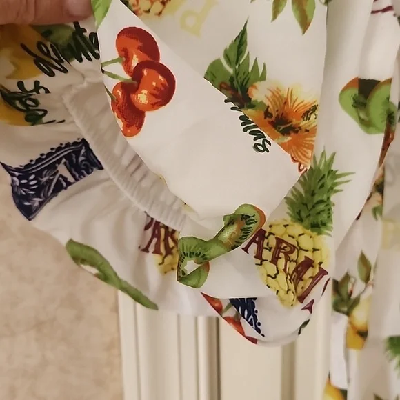 shirt dress with floral and graphic prints. Button-up front.pit To pit 19" - Picture 7 of 8